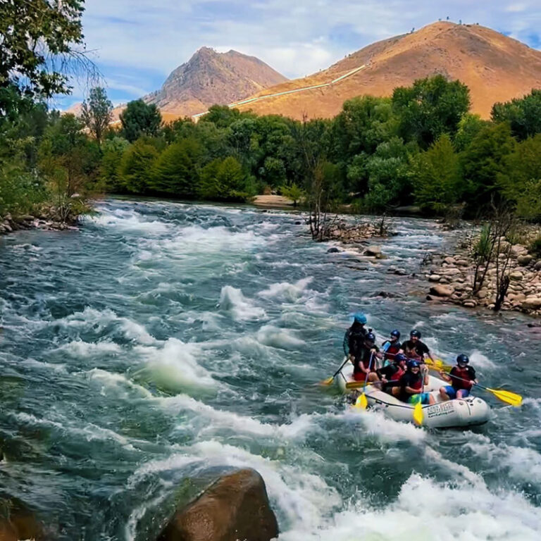 Rafters float right by The Kern River House at Big Daddy Rapids!